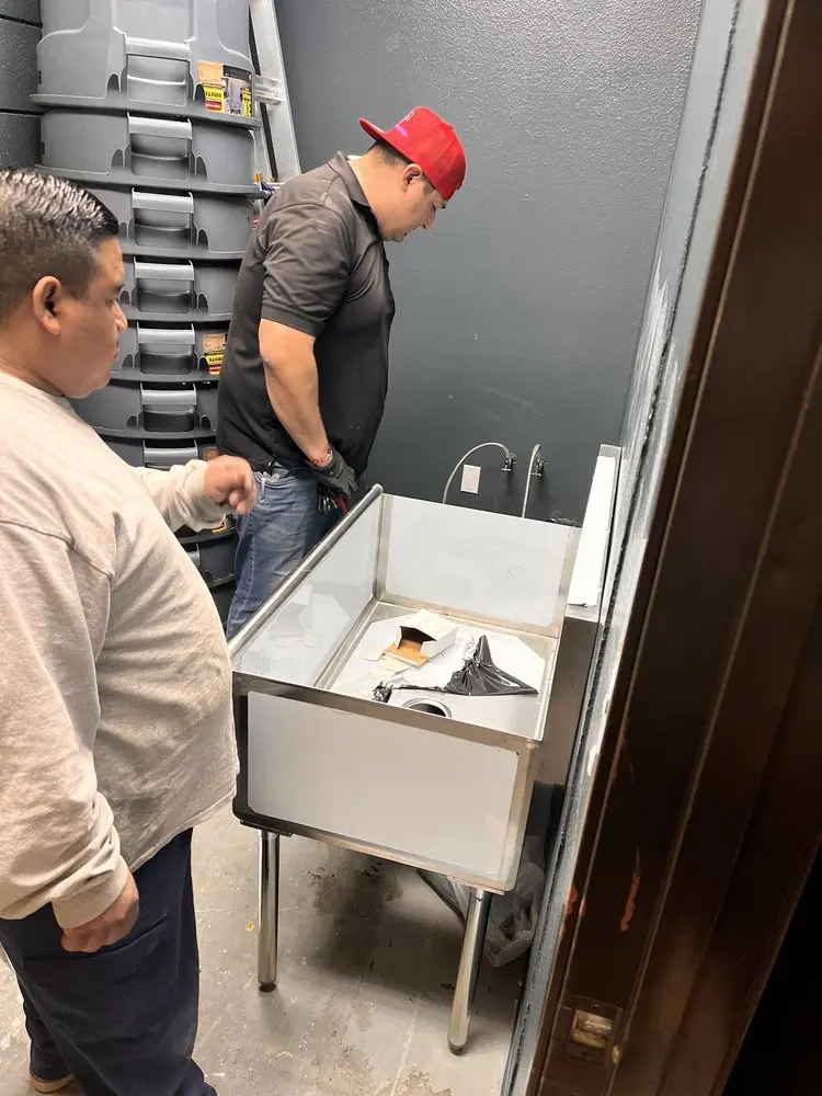 Commercial plumbing and sink installation in Cushing